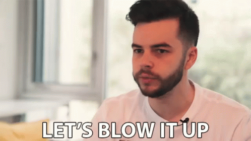 Man with Beard Saying Let's Blow It Up