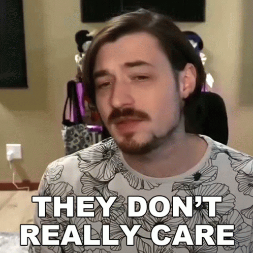 Man With Beard Saying They Don't Really Care GIF