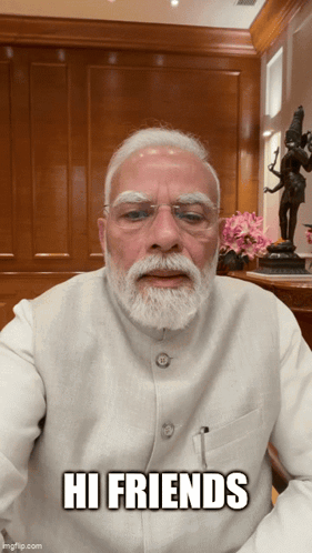 Man With Beard Says Hi Friends GIF