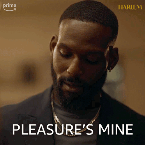 Man With Beard Says Pleasure's Mine Wearing Necklace