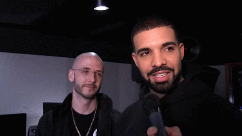 Man With Beard Singing Into Microphone GIF