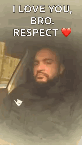 Man with Beard Sitting in Car