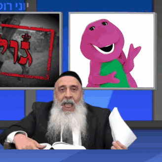Man With Beard Sitting in Front of Barney Screen