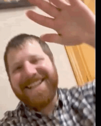 Man With Beard Smiling And Waving GIF