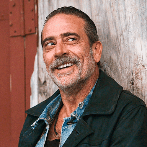 Man With Beard Smiling In Black Jacket GIF