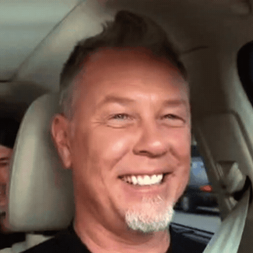 Man With Beard Smiling In Car Seat GIF
