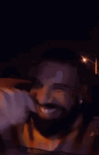 Man with Beard Smiling in Car