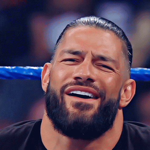 Man With Beard Smiling In Wrestling Ring GIF