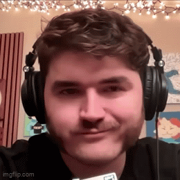 Man With Beard Smiling Wearing Headphones GIF