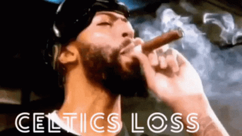 Man with Beard Smoking Cigar