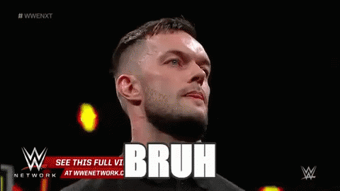 Man with Beard Standing Before Bruh Sign
