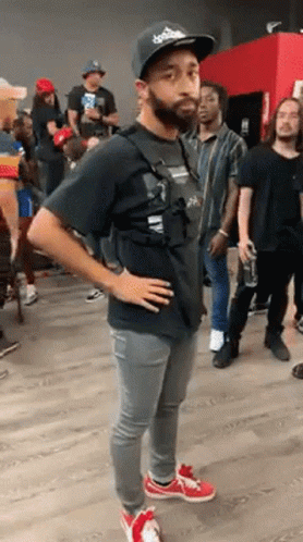 Man With Beard Standing Hands On Hips GIF