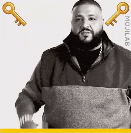 Man with Beard Standing in Front of Keys