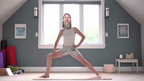 Man With Beard Standing on Yoga Mat