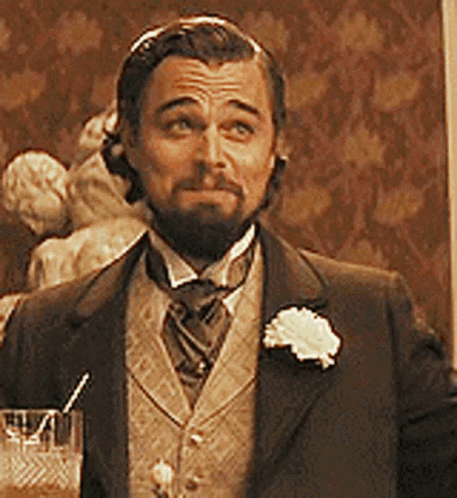 Man With Beard Suit Tie Holding Glass With Straw GIF