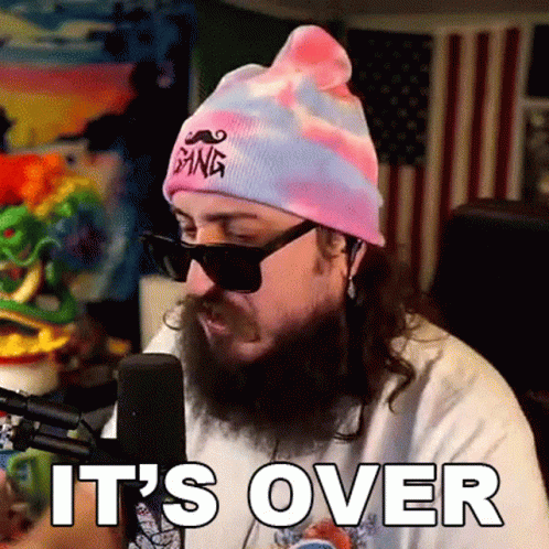 Man with Beard Sunglasses and Hat Says Its Over
