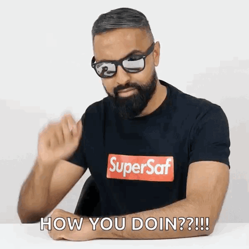 Man with Beard, Sunglasses, and Supersaf T-Shirt