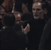 Man With Beard Surrounded by People