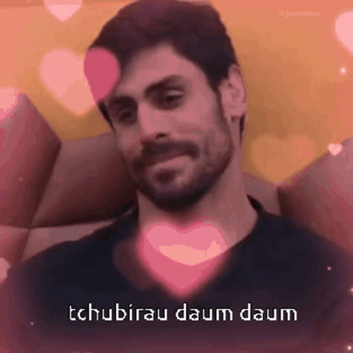 Man With Beard Surrounded by Pink Hearts Tchubirau Daum Daum