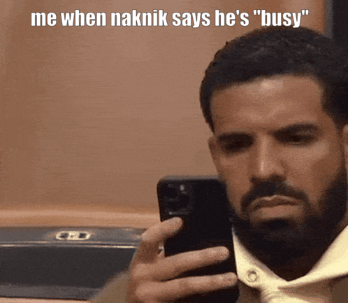 Man with Beard Taking Selfie