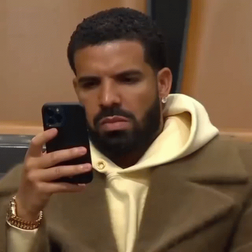 Man with Beard Taking Selfie