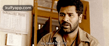 Man With Beard Talking About Friend With HIV GIF