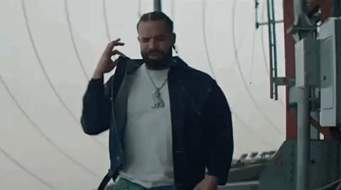 Man with Beard Talking on Cell Phone