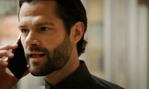 Man With Beard Talking On Cellphone GIF