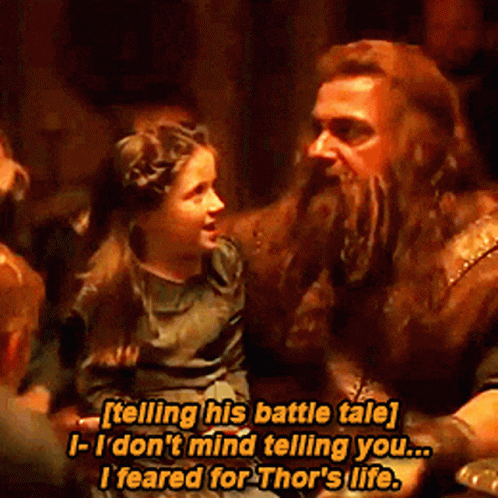 Man With Beard Talking to Little Girl