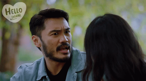 Man With Beard Talking To Woman GIF