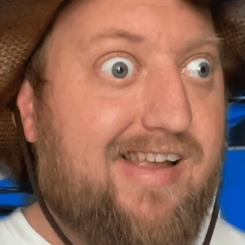 Man With Beard Wearing Cowboy Hat Making Funny Face GIF