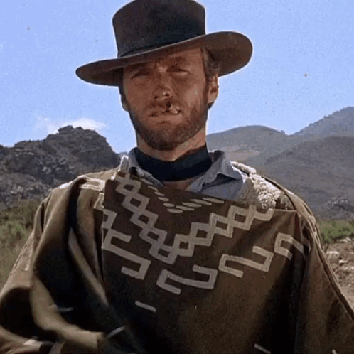Man with Beard Wearing Geometric Poncho