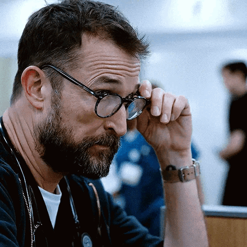 Man With Beard Wearing Glasses and Watch