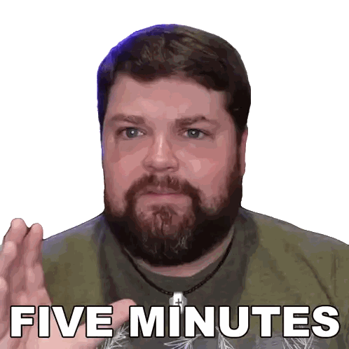 Man with Beard Wearing Green Five Minutes Shirt
