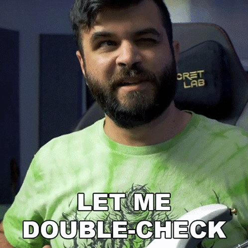Man With Beard Wearing Green Tie Dye Shirt Let Me Double Check