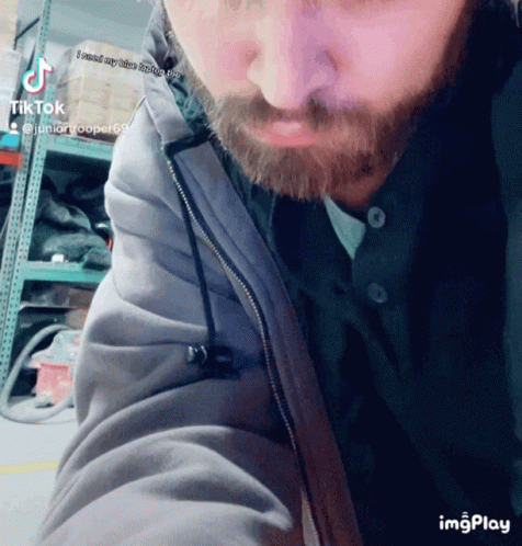 Man with Beard Wearing Grey Jacket
