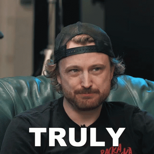 Man With Beard Wearing Hat and Black Shirt Truly