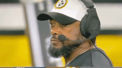 Man With Beard Wearing Hat and Headphones