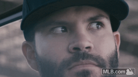 Man with Beard Wearing Hat and MLB Logo
