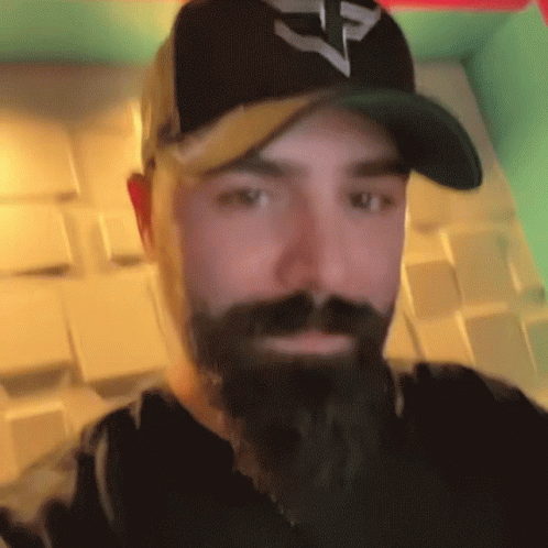 Man With Beard Wearing Hat With F on It