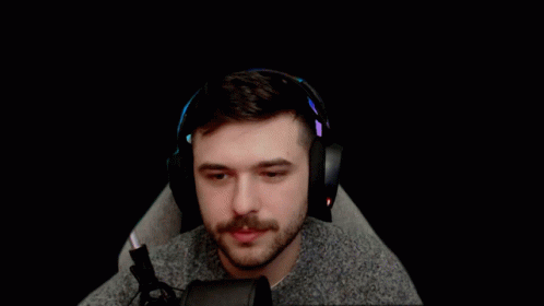 Man with Beard Wearing Headphones