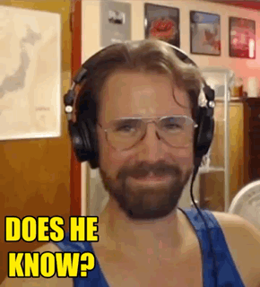 Man with Beard Wearing Headphones and Glasses