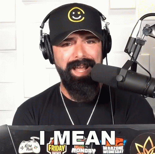 Man With Beard Wearing Headphones and Hat I Mean Friday