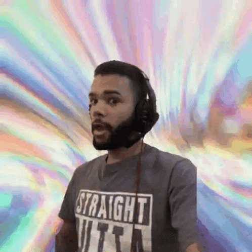Man With Beard Wearing Headphones and T-Shirt