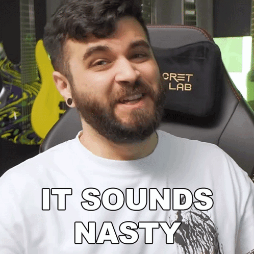 Man with Beard Wearing Nasty Shirt