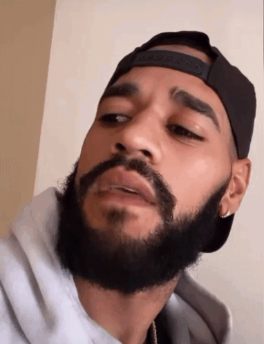Man with Beard Wearing NBA Hat