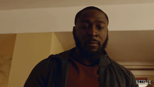 Man with Beard Wearing Netflix Jacket