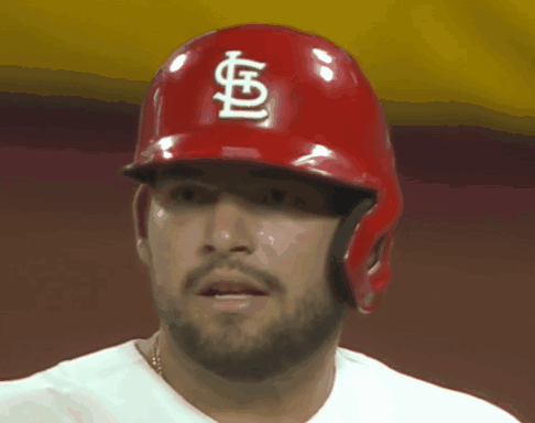 Man With Beard Wearing Red Helmet Letter S
