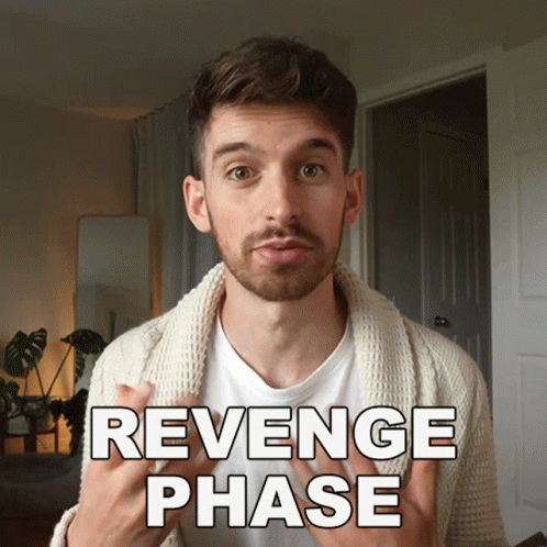 Man with Beard Wearing Revenge Phase Sweater