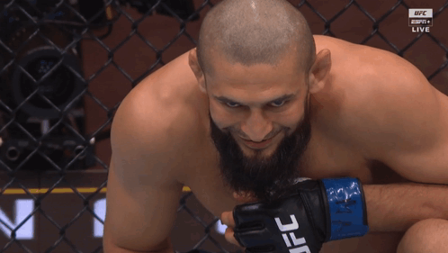 Man with Beard Wearing UFC Glove